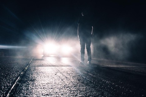 Why Alcohol Hits Harder After 65 - Man walking on the road with an impaired Driver